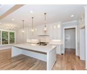 Custom Cabinetry with Hidden Butlers Pantry