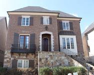 Burgandy French inspired exterior built by Atlanta home Builder Waterford Homes